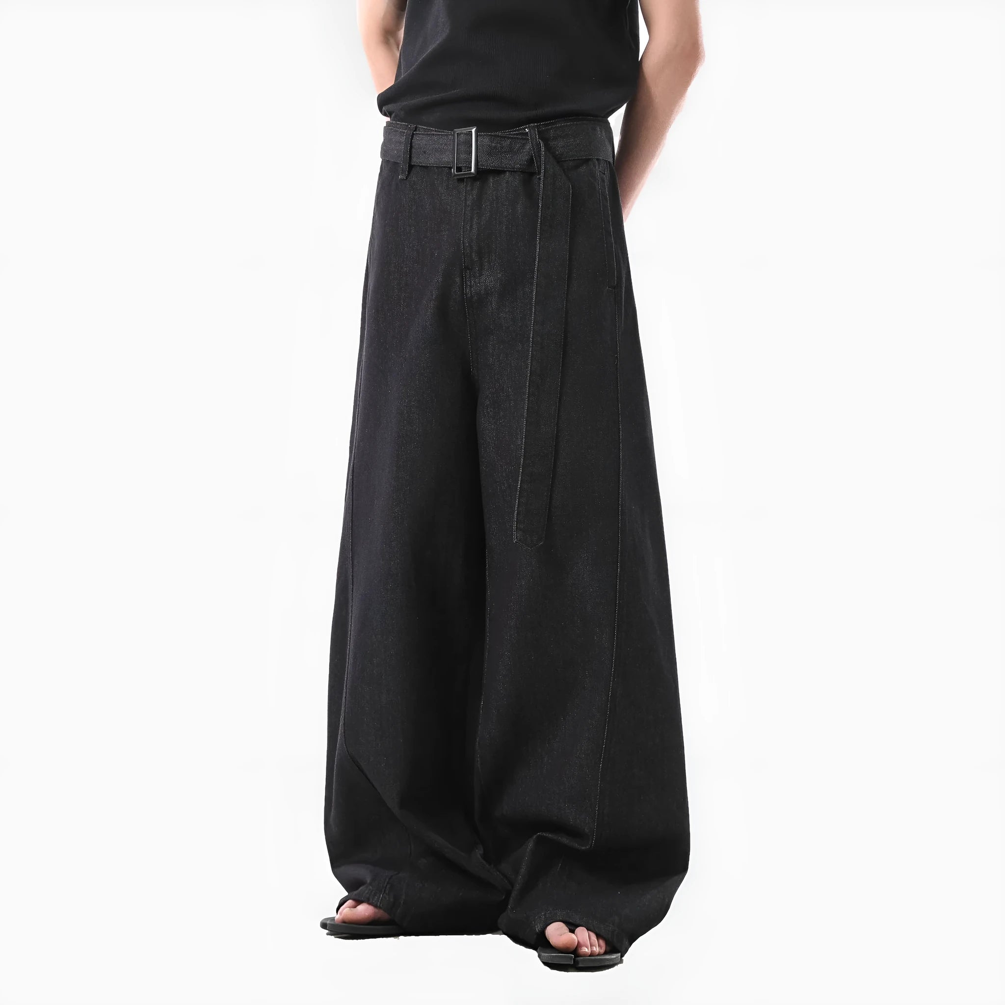 Black women's high waist straight leg jeans with gold detailing and a zip fly.