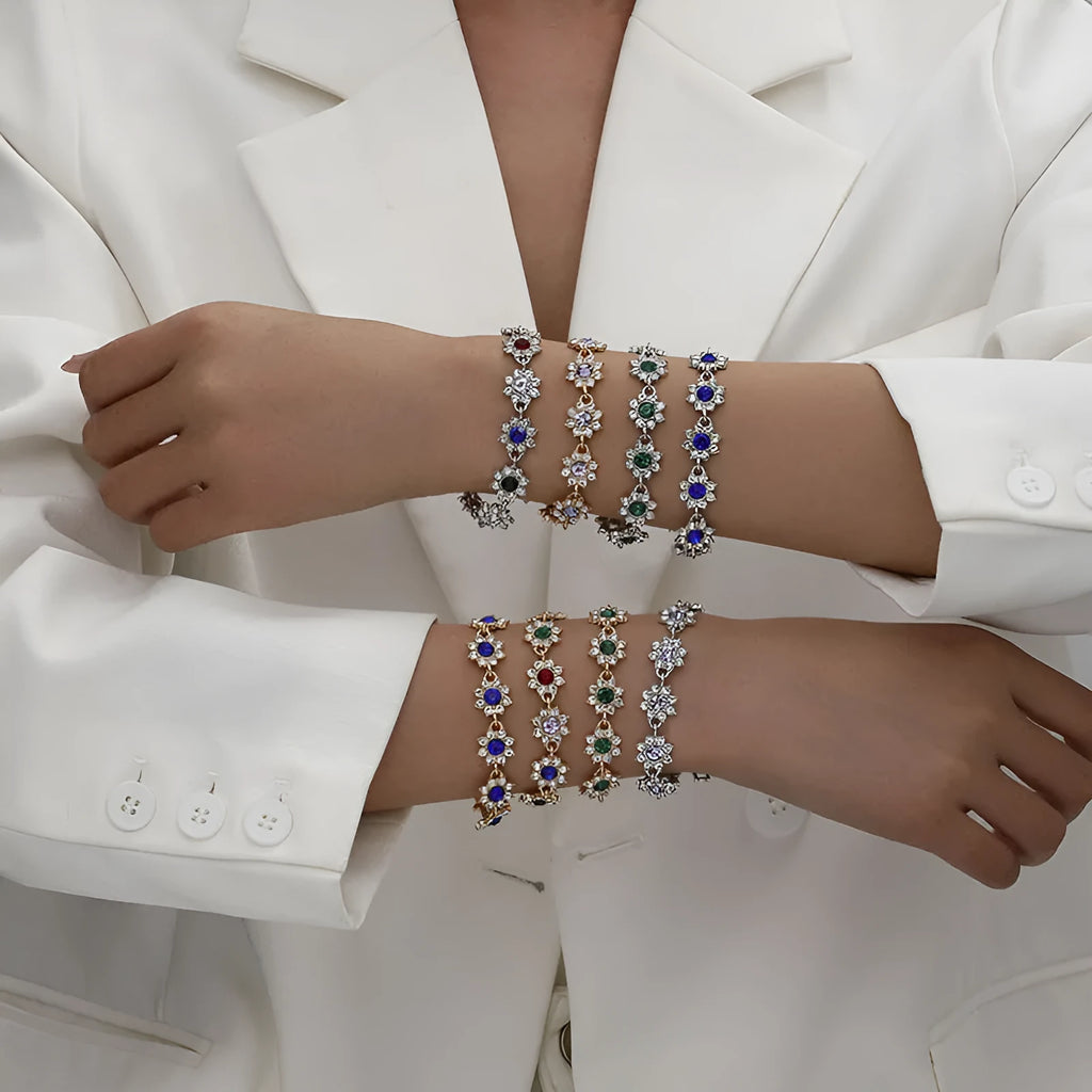 Women's zinc alloy bracelet with flower design and electroplated finish in gold and silver colour options