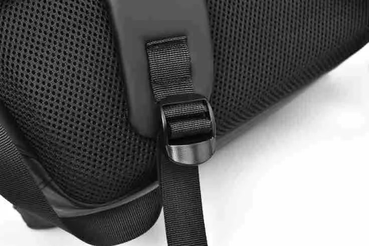 Large waterproof PU leather backpack for men in black, shown with computer compartment