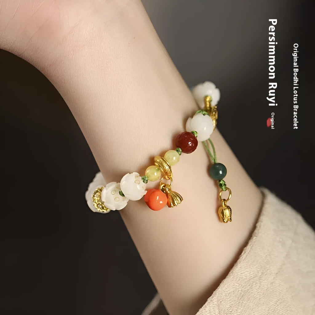 Hand-woven white jade bodhi bracelet showing pumpkin and lotus beads on adjustable open rope