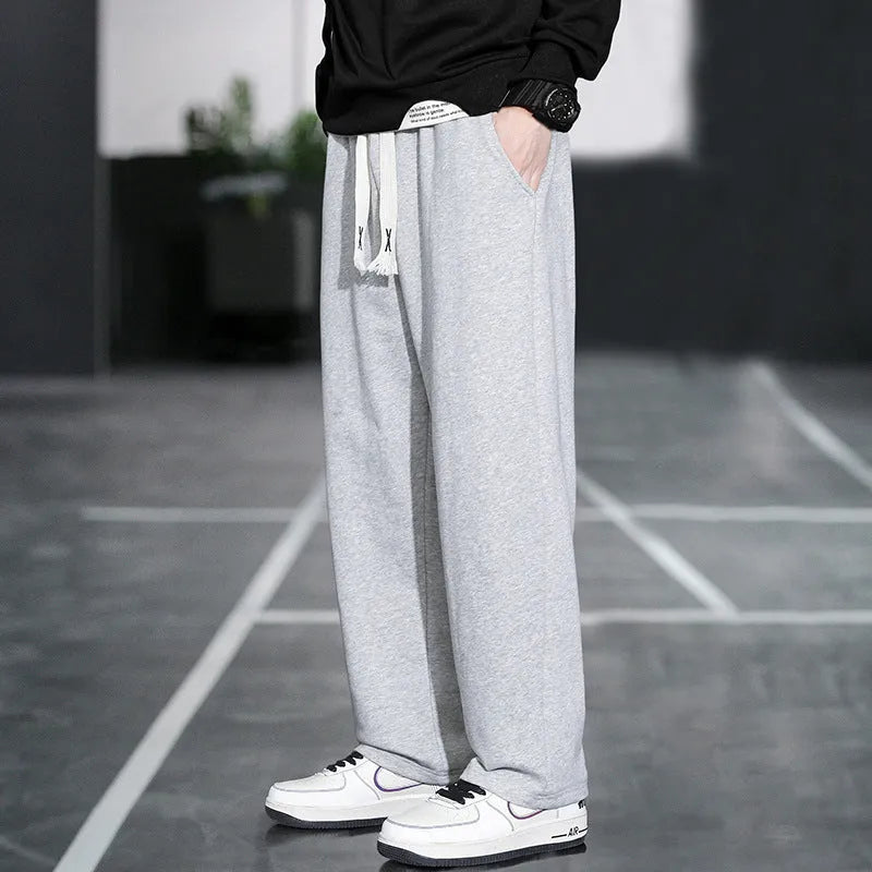 Men's grey bamboo fibre sports trousers with multiple pockets and high waist design