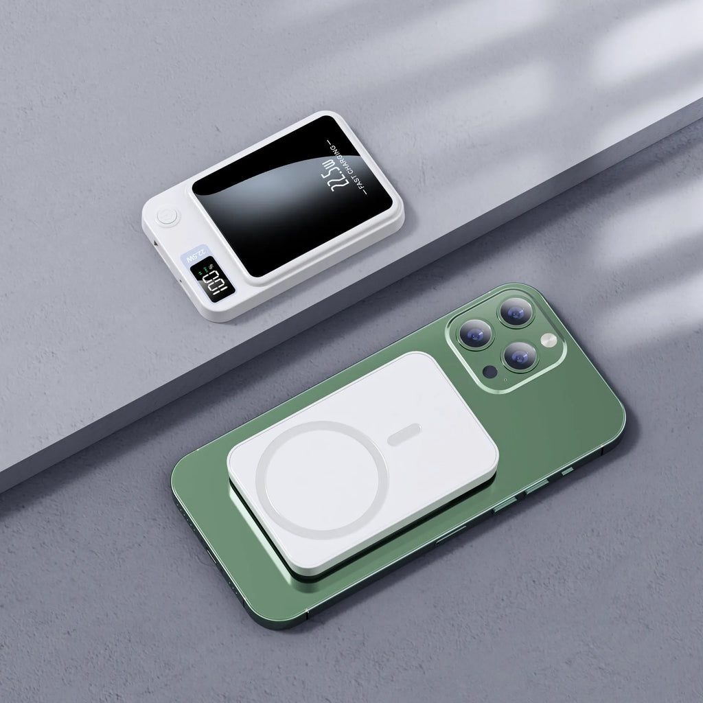 Wireless Magsafe power bank in black with compact industrial design showing charging surface