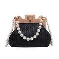 Women's woven straw shoulder bag with pearl chain detail showing horizontal square shape and internal compartments