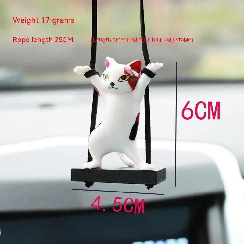 Cartoon-style resin cat pendant for car interior decoration in one of five colour options.