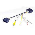 Black Volkswagen Skoda MIB host RGB camera signal conversion box for reverse camera installation.