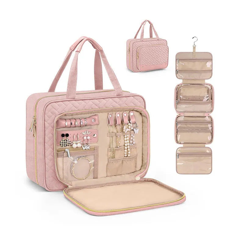 Pink waterproof hanging cosmetic bag with dimensions 30.5 cm wide shown suspended from a hook