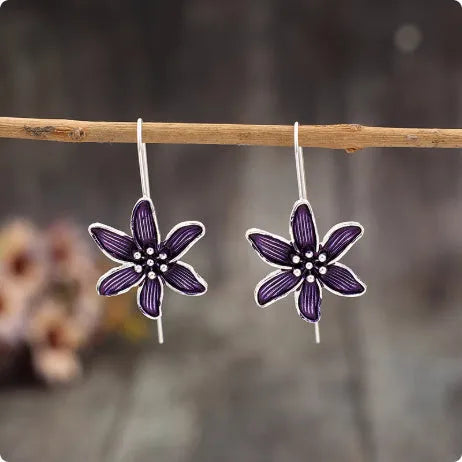 Purple flower-shaped alloy earrings with electroplated finish and butterfly back fastenings