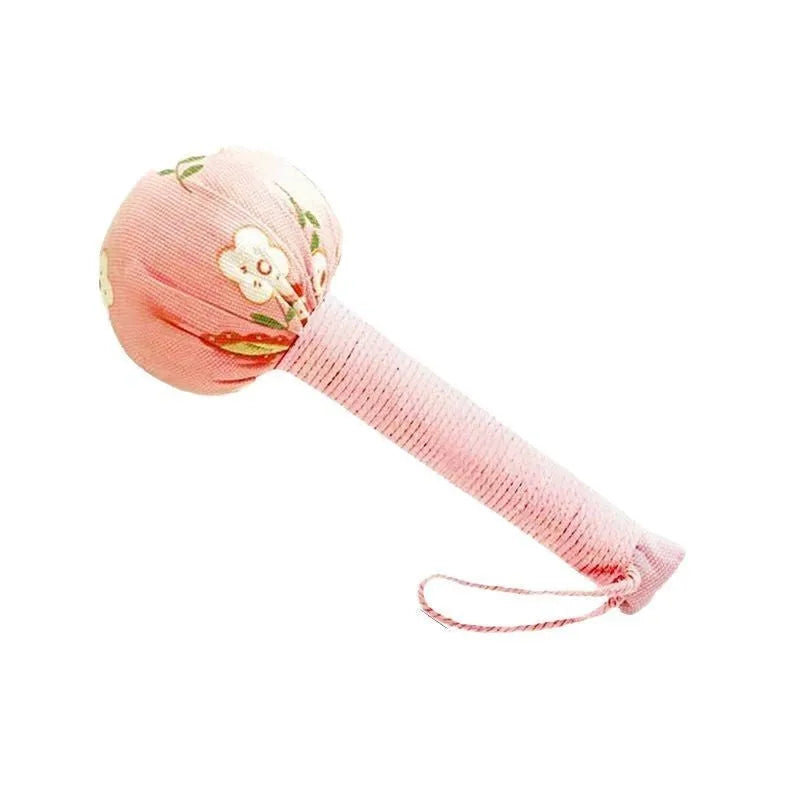 Argy wormwood hand-held massage hammer in green colour on a 26cm scale.