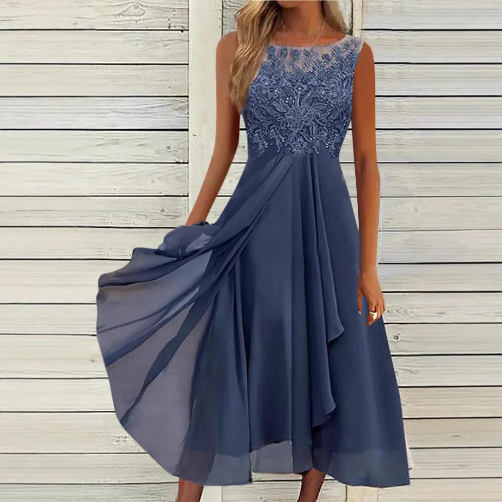 Women's sleeveless green chiffon dress with lace embroidery and a mid-length flowy skirt.