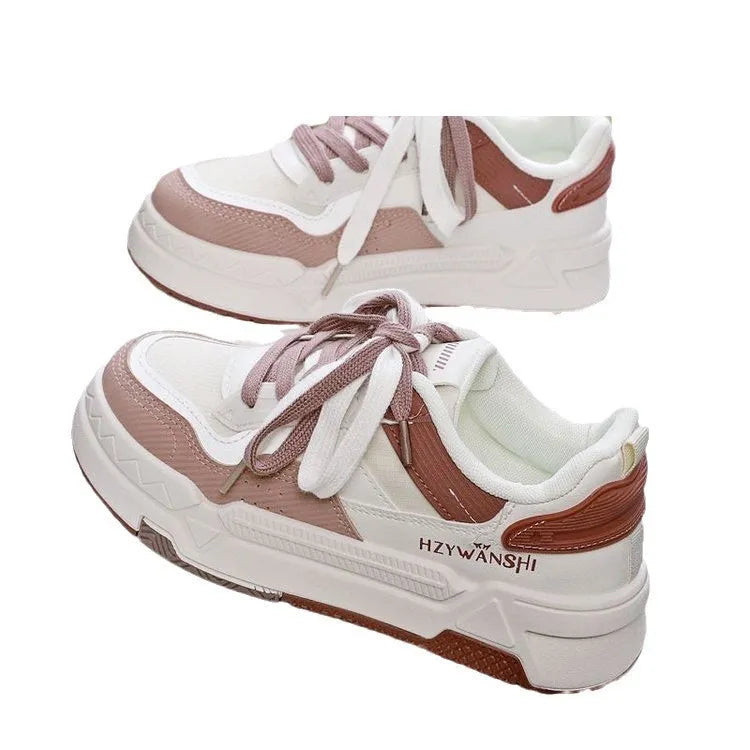 Beige children's board shoes with thick rubber sole, cross shoulder straps, and front lace-up closure on a white background.