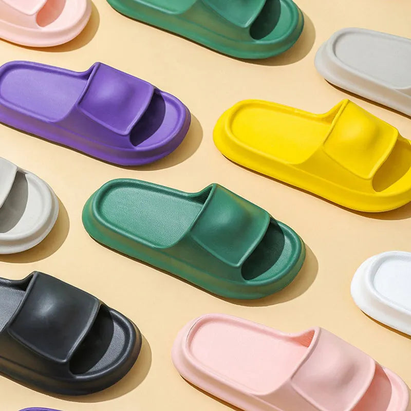 Thickened EVA non-slip slippers in various colours showing the flip-flop design and textured sole.