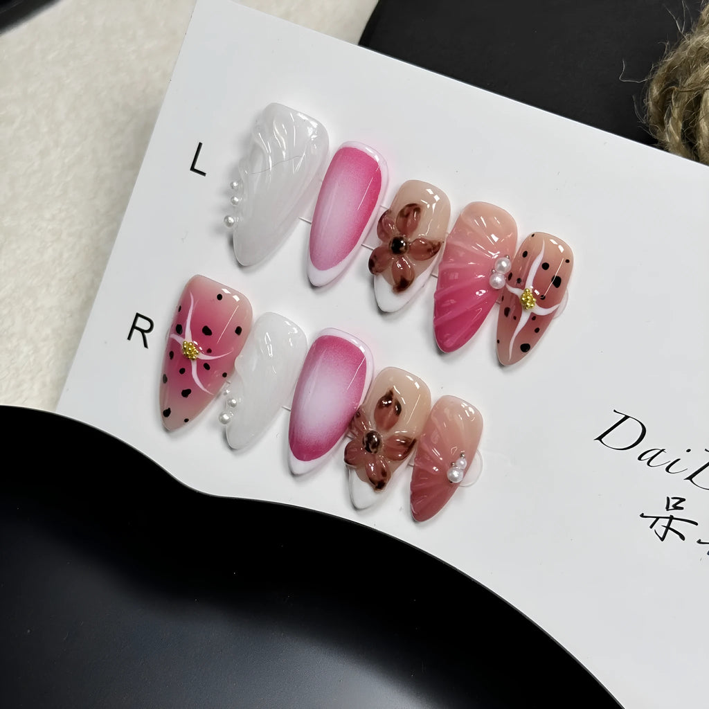 Hand-painted 3D carved nail art patches with embossed candy pattern on an Almond-shaped nail.