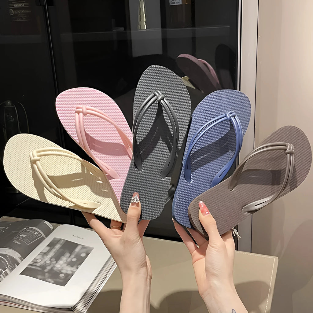 Men's casual PVC flip flops in beige with toe-covering design and textured non-slip sole.