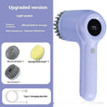 USB rechargeable electric cleaning brush in light grey or purple with multiple cleaning heads for kitchen use