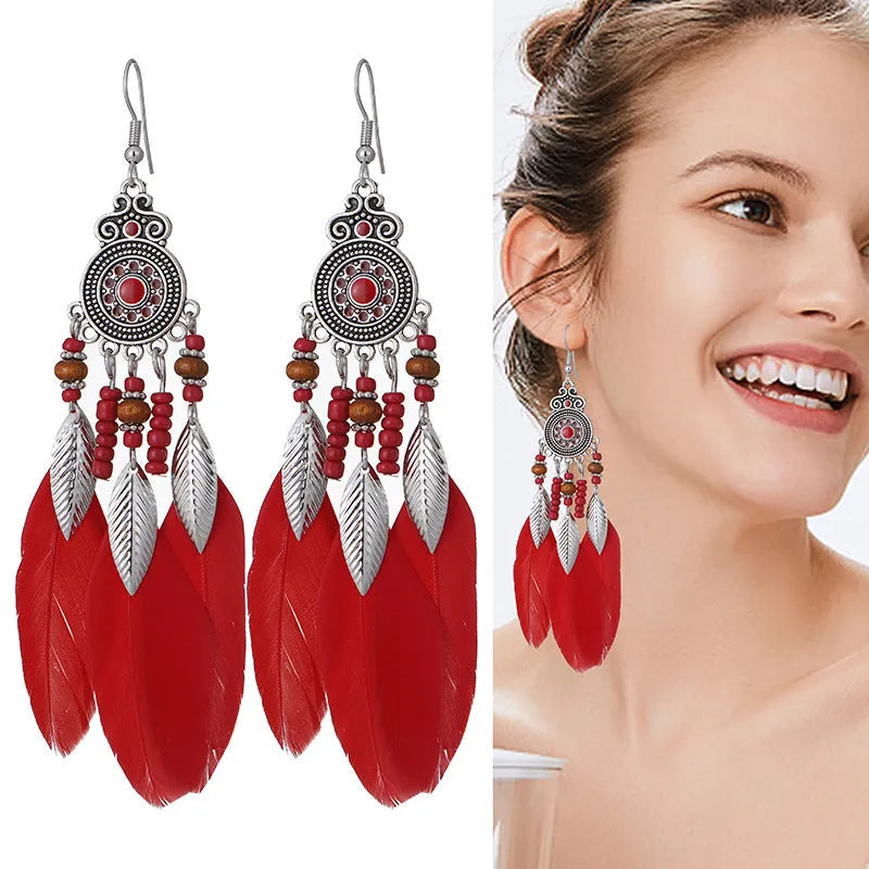 Feather-shaped alloy drop earrings with leaf patterns in electroplated colours for bohemian style