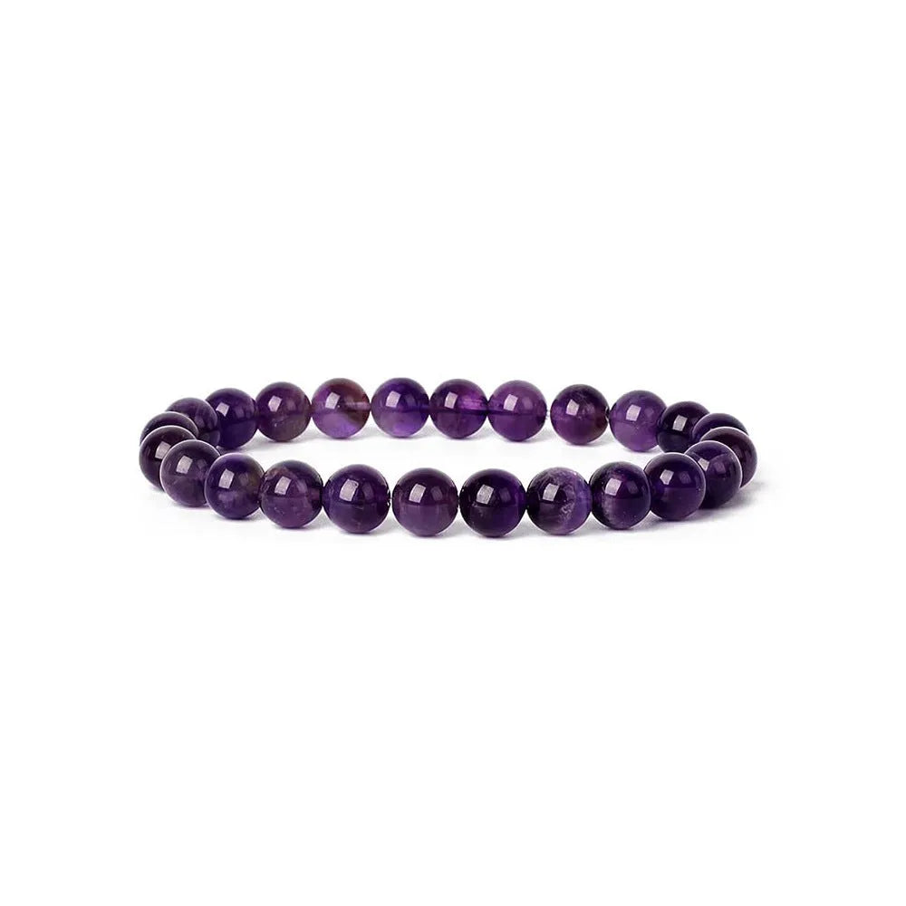 Handmade 8mm natural stone bead bracelet for women in geometric shape on a wrist.