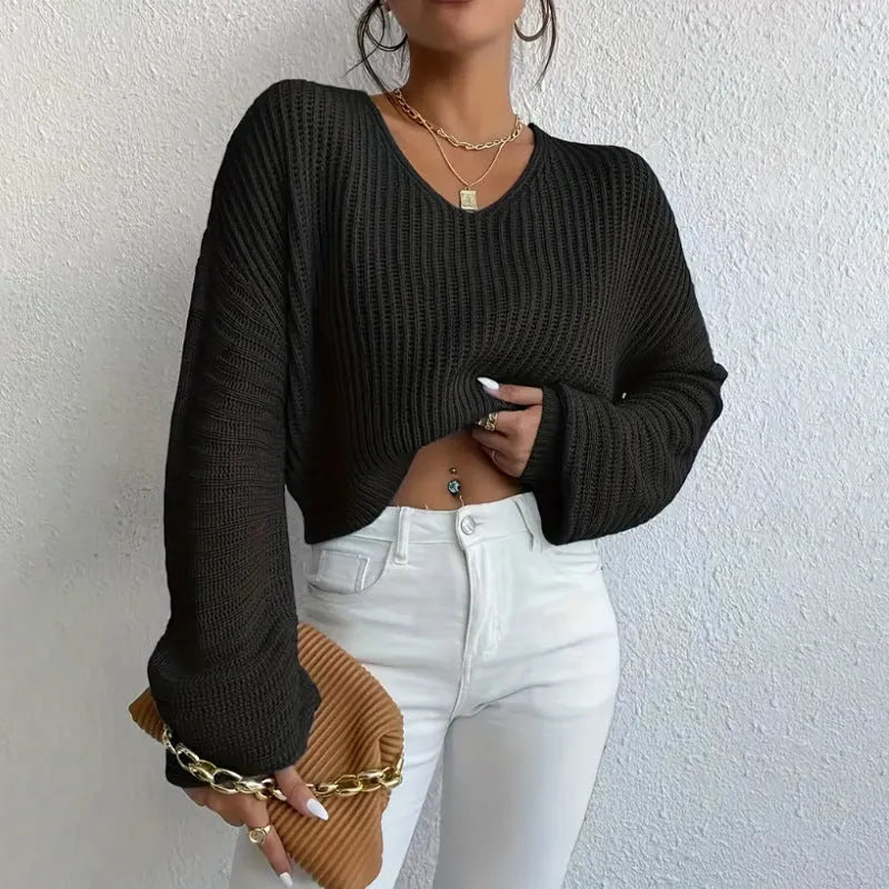 Women's solid colour long sleeve pullover top in a loose casual fit.