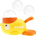 Yellow duck-shaped dog treat dispenser with rotating food container and non-slip base on floor