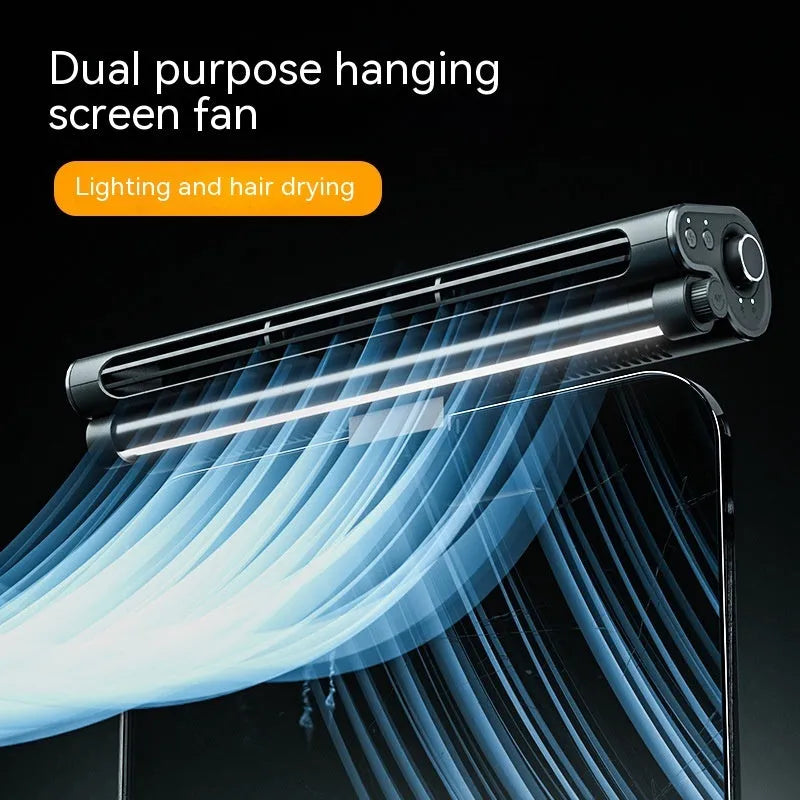 Black bladeless USB desk fan with clip attached to a laptop screen, showing integrated LED light.