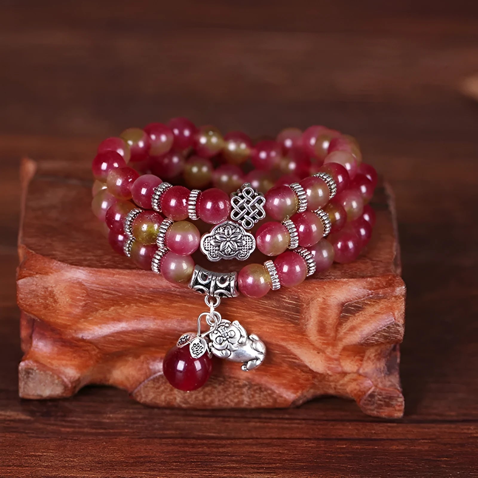 Watermelon crystal Chinese knot bracelet showing traditional design and natural crystal material