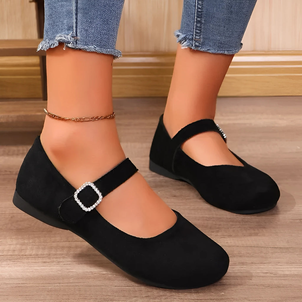 Black canvas fisherman shoes with rubber sole showing low-top design