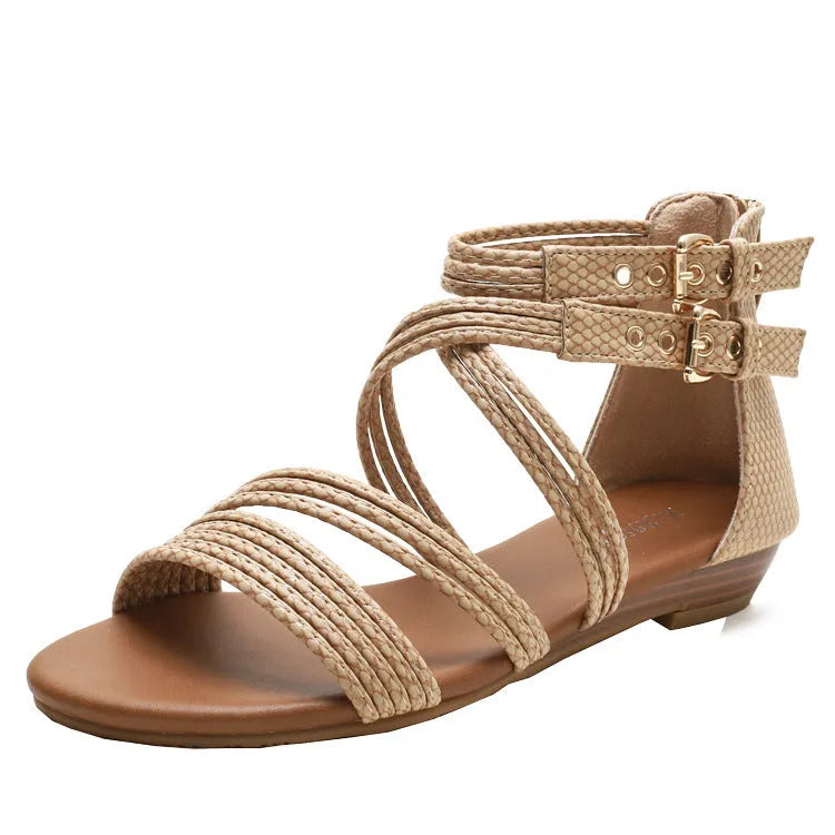 Women's black open-toe Roman sandals with cross straps, wedge heel, and back zipper.