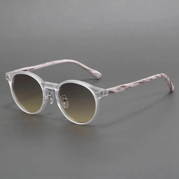 Retro round rim sunglasses with frosted frame and UV-protective lenses in multiple colour options.
