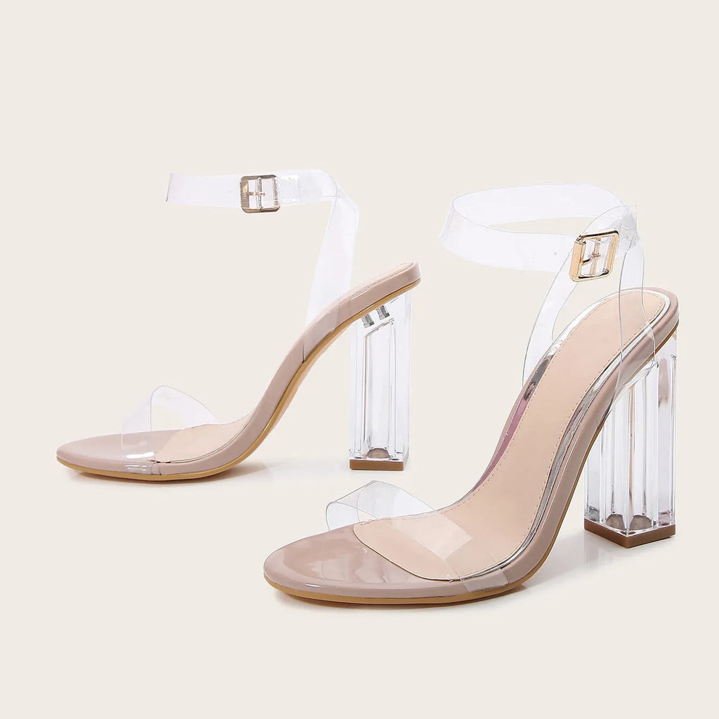 Apricot women's high heel sandals with a clear glass-style heel and a buckle fastening.