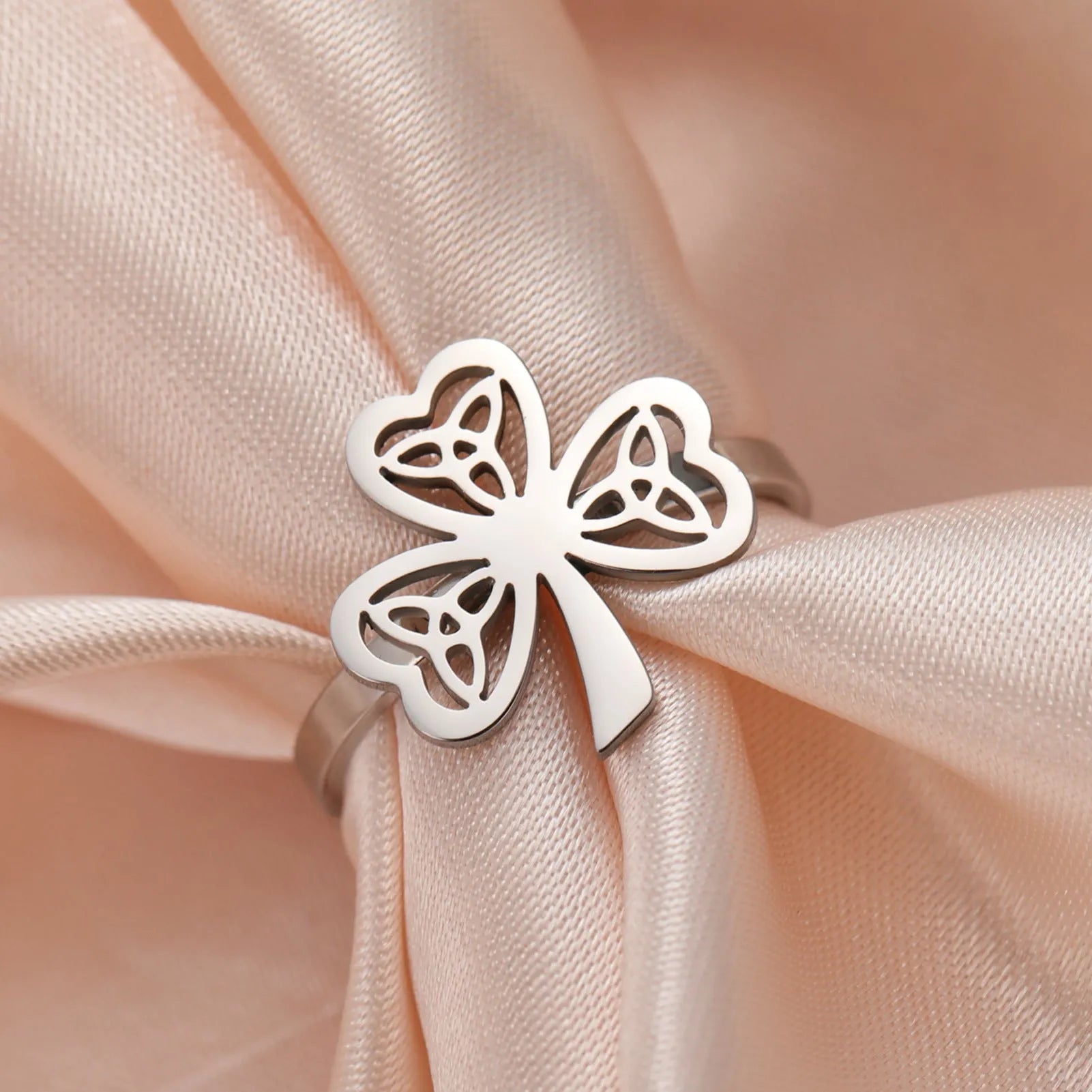 Stainless steel lucky hollow ring in gold or steel colour on size display