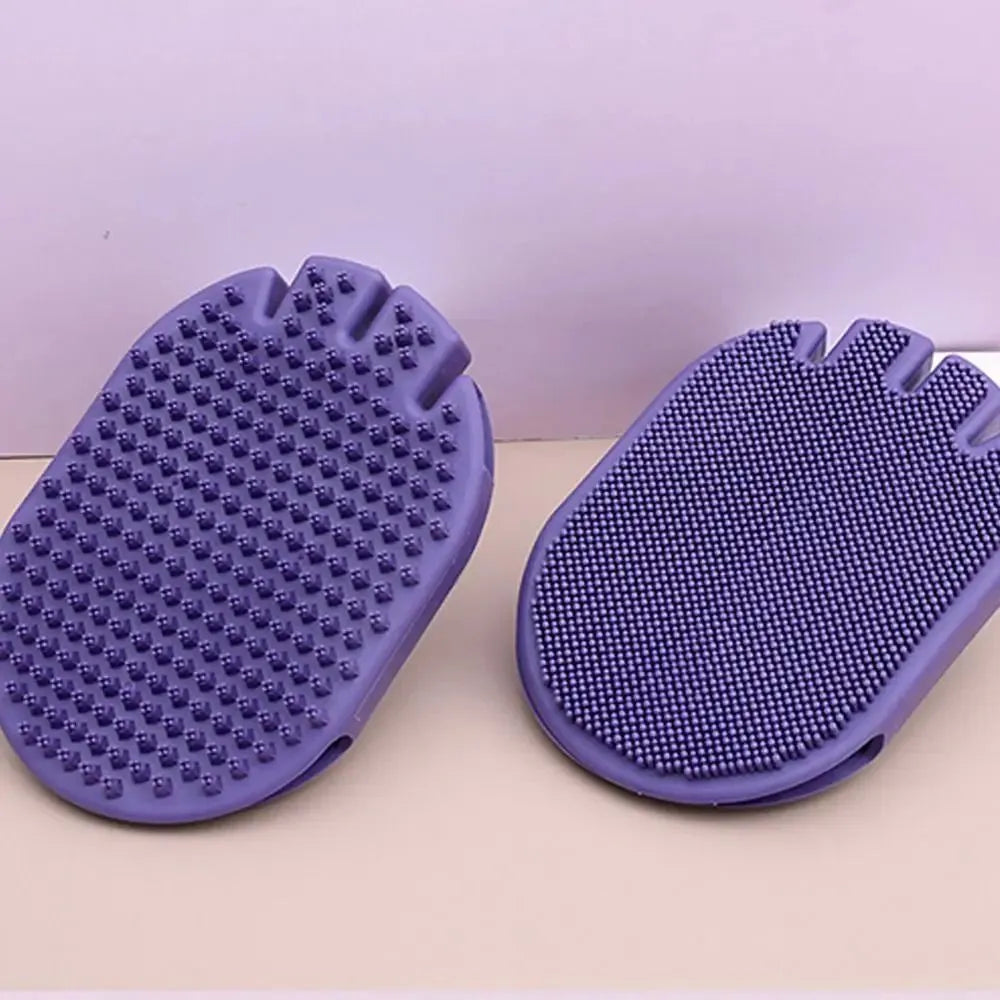 Purple dual-sided pet massage shampoo brush with soft TPR bristles and ergonomic handle