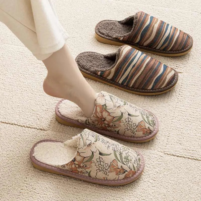 Household cotton slippers with winter linen surface and PVC sole in various floral colour patterns