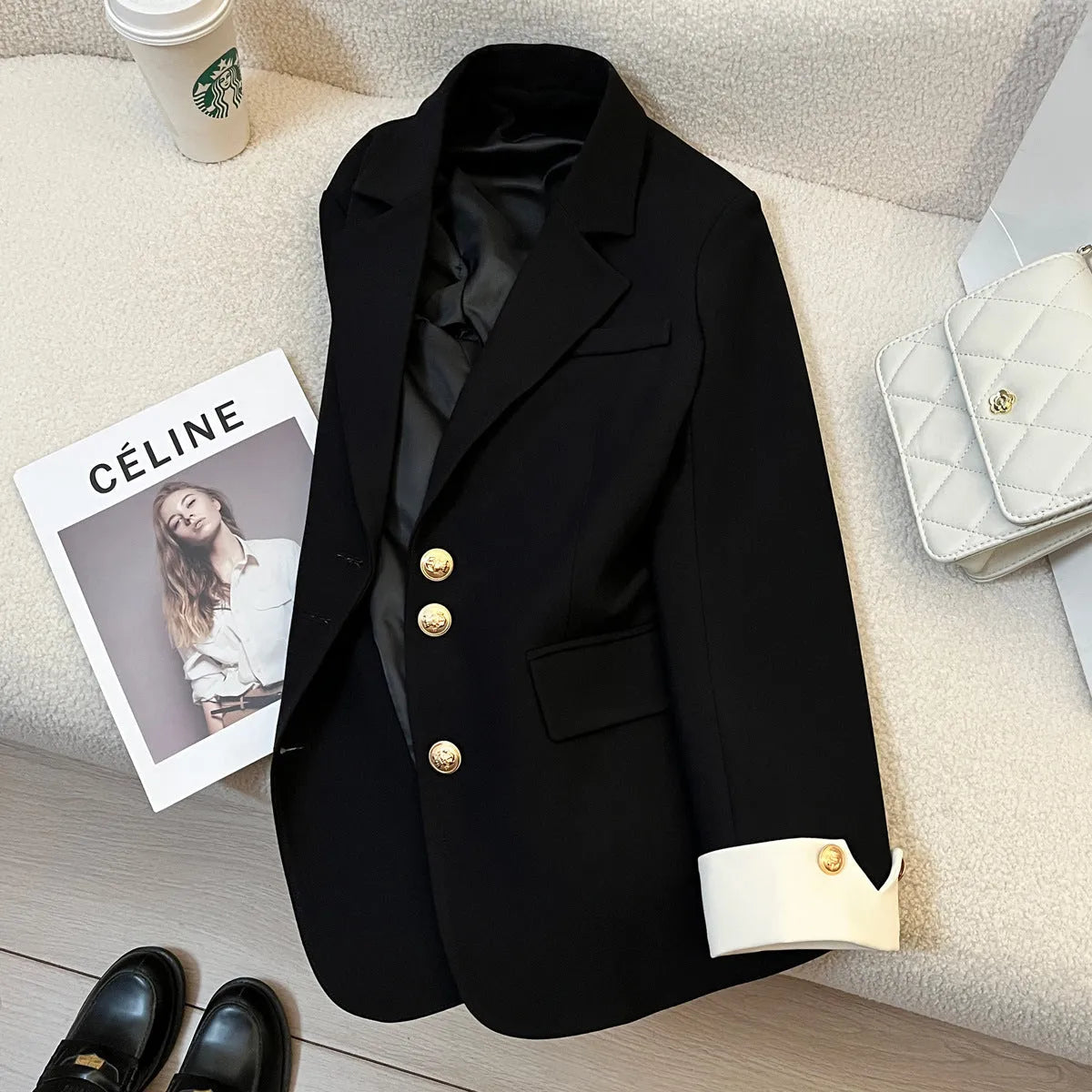 Korean style loose fit women's coat in milky white, showing front view with pockets.
