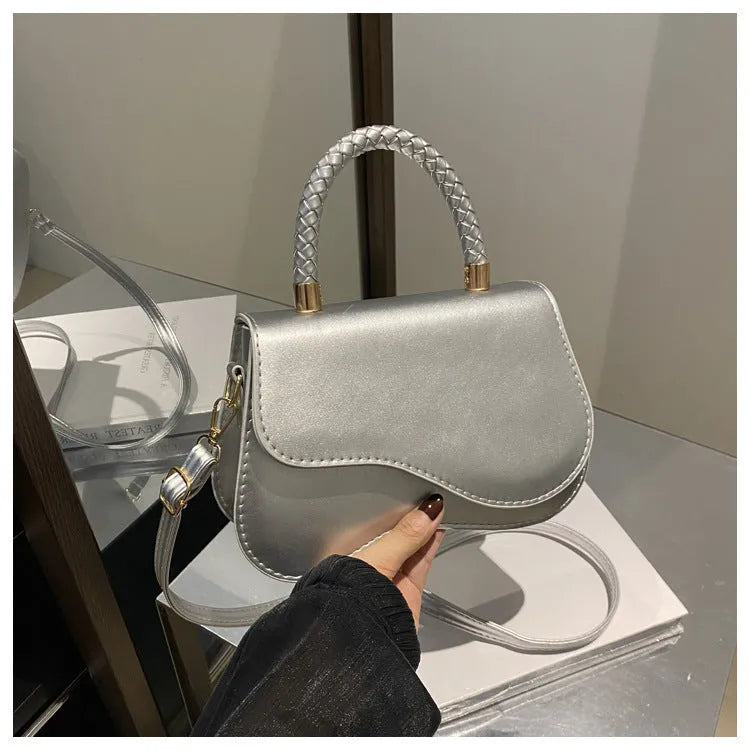 Soft PU one-shoulder bag with magnetic snap, horizontal square shape, shown in khaki with optional pendant.