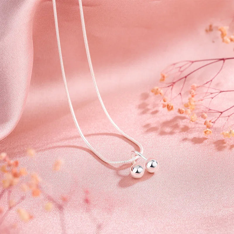 925 silver cherry fruit pendant on a snake bone chain necklace, adjustable from 21 to 50 cm.