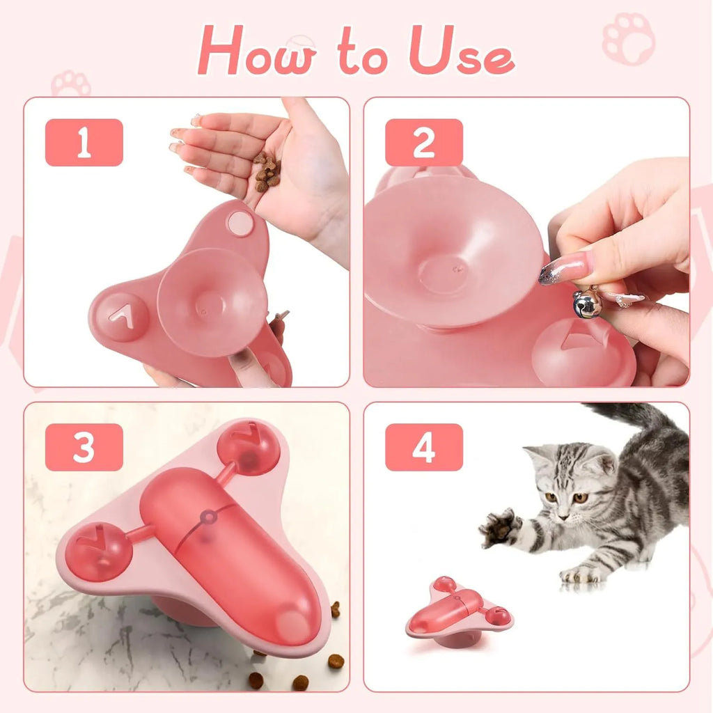 Blue interactive pet puzzle feeder toy with bell, catnip and airplane snack cabin on suction cup base.