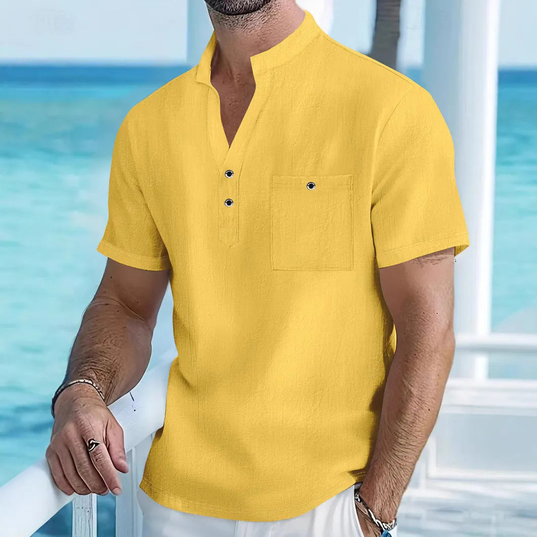 Men's loose fit linen T-shirt with a stand collar and short sleeves in a light blue colour.