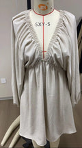 Women's apricot V-neck dress with long puff sleeves and a flounced swing skirt, mid-waist fit.