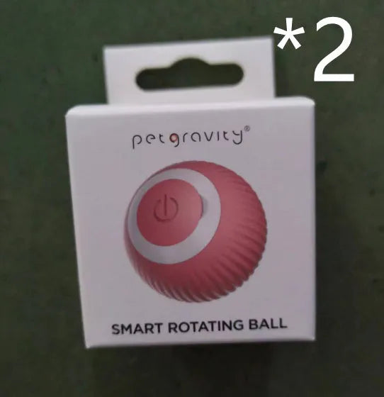 Green and pink electronic rolling ball cat toy with intelligent obstacle avoidance system