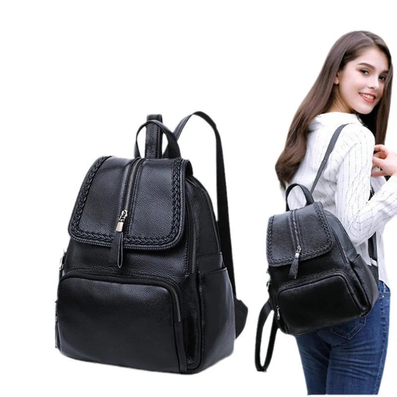 Solid colour genuine leather women's backpack showing internal organisation compartments