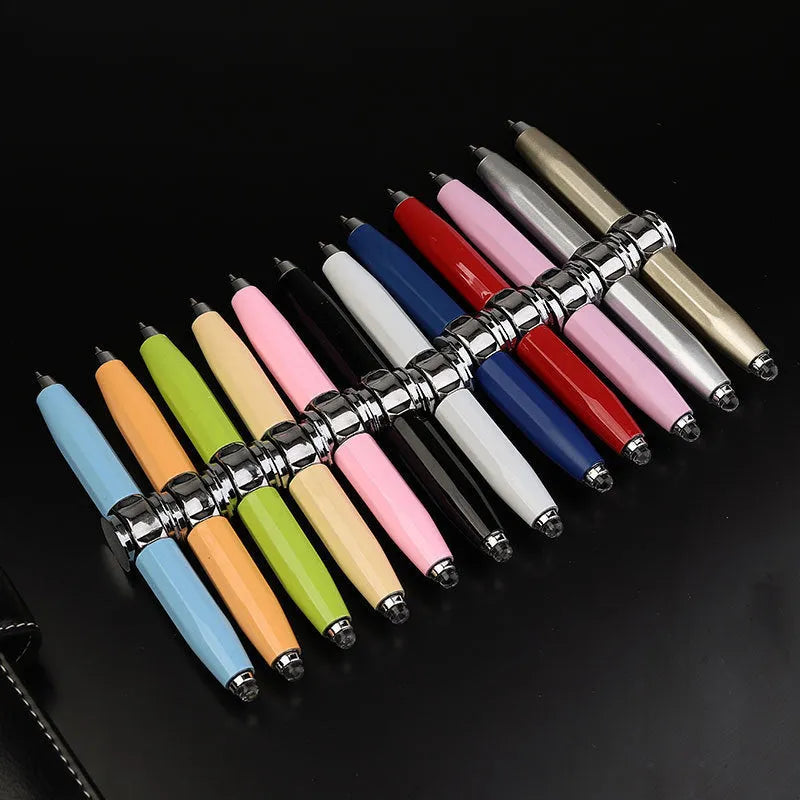 Metal gyro ballpoint pen with LED spinner at base, showing 10.5cm length and available ink colour options.