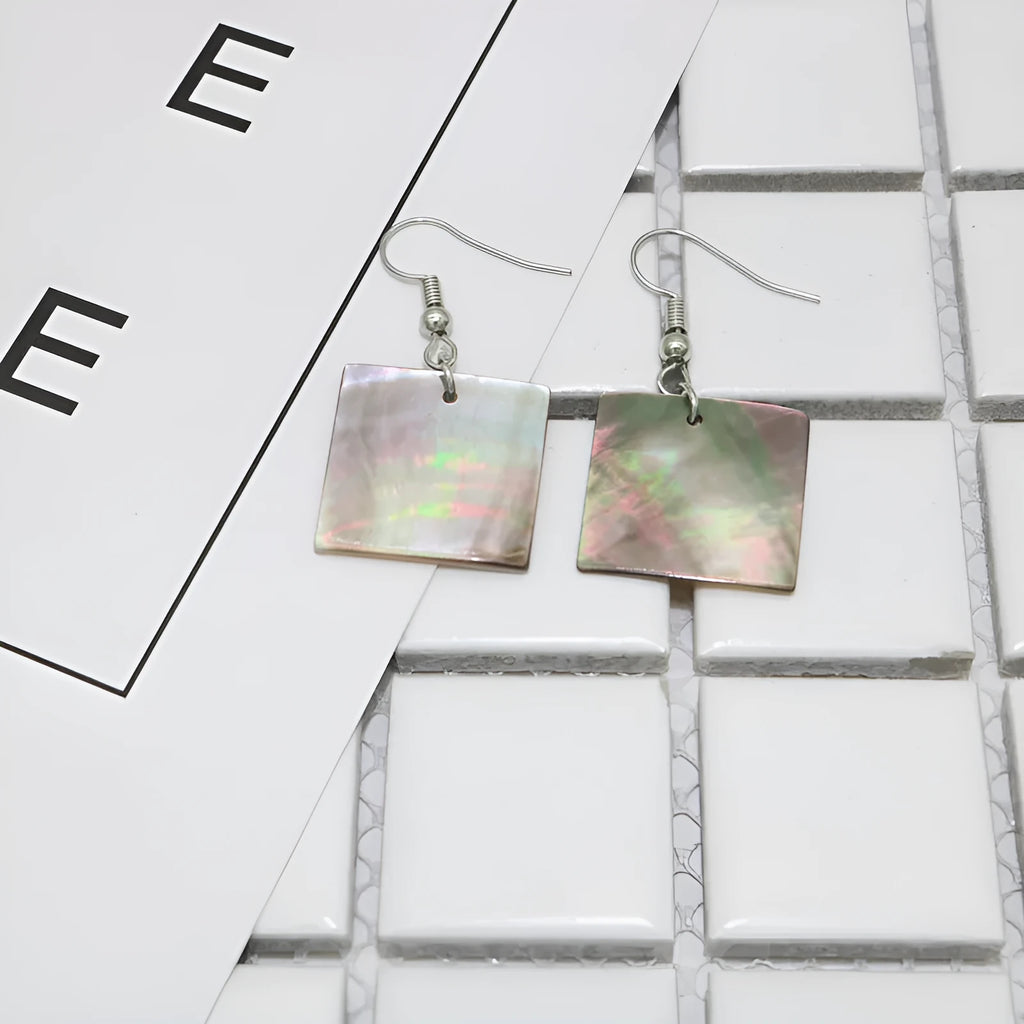 Geometric shell earrings in square panther or rectangular shell designs with natural finish