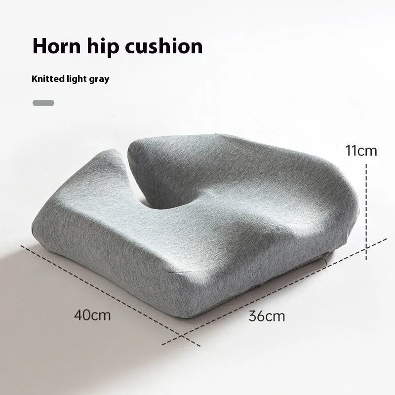 Memory foam office chair cushion in grey on desk chair