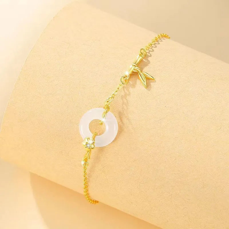 Women's silver bracelet with gold plating and white chalcedony starry sky design