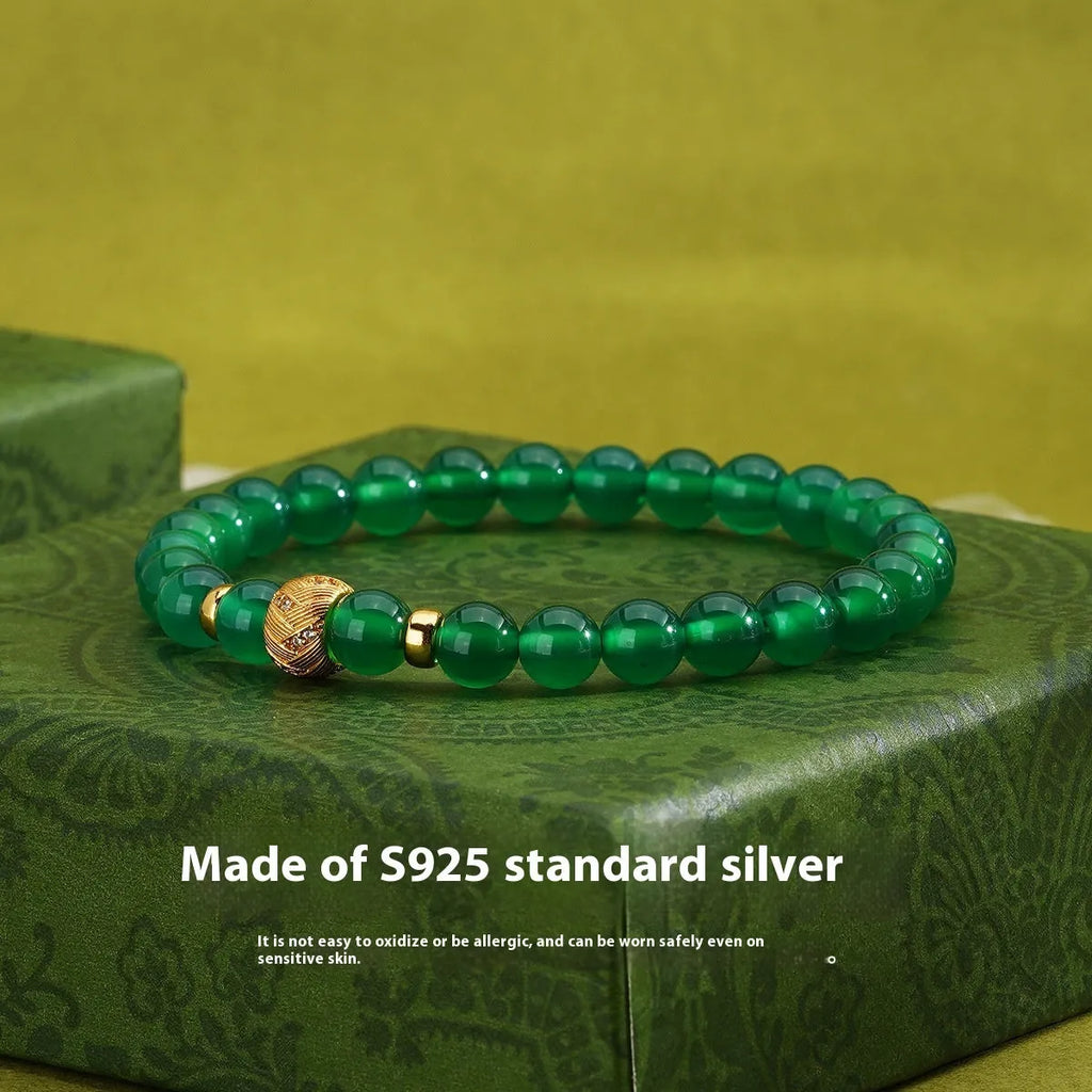 Green agate and sterling silver bracelet with 6mm geometric beads and yellow gold finish