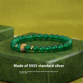 Green agate and sterling silver bracelet with 6mm geometric beads and yellow gold finish