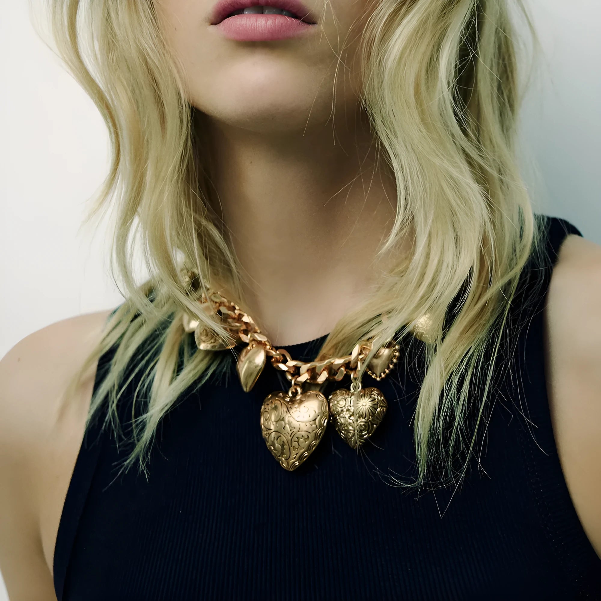 Carved heart pendant necklace on adjustable chain in gold or white K colour