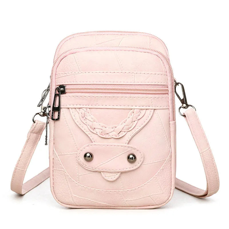 Soft brown PU leather square vertical mobile phone bag with woven detailing and rivets.
