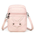 Soft brown PU leather square vertical mobile phone bag with woven detailing and rivets.