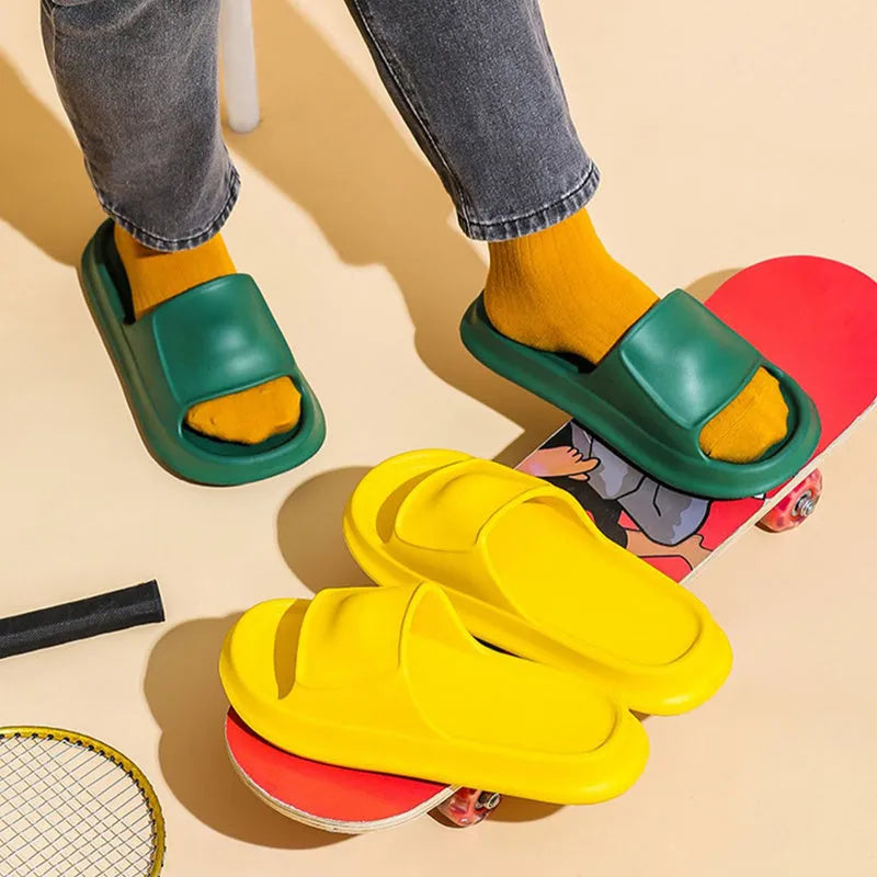 Thickened EVA non-slip slippers in various colours showing the flip-flop design and textured sole.
