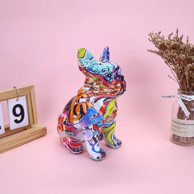 Graffiti-coloured French bulldog resin statue on a shelf, showing modern simple style.